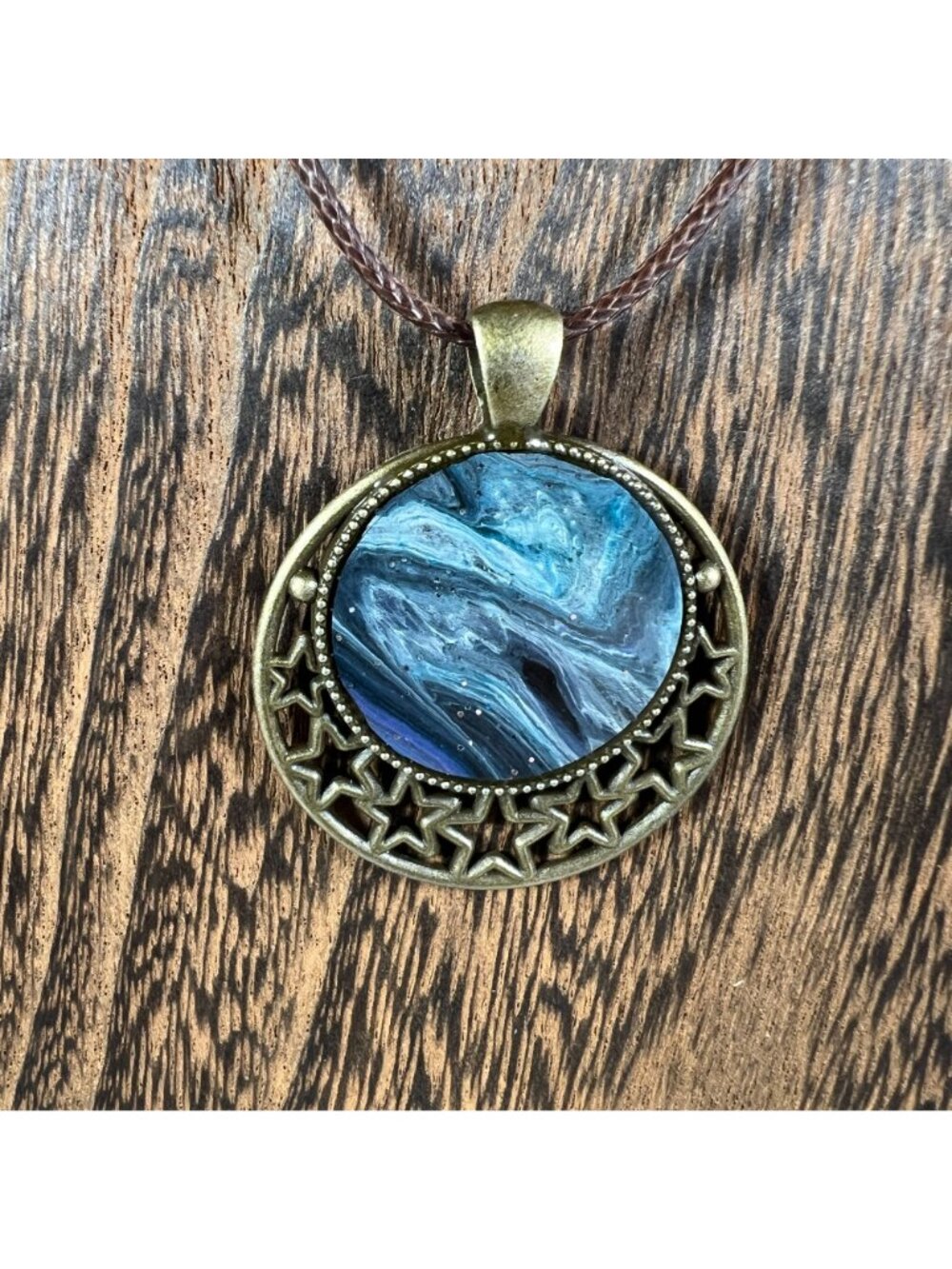 Starry Bronze Pendant With Blue Acrylic Pour Design Necklace - Picture 2 of 3